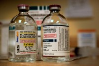 Two vials of Fluorouracil. The liquid inside the glass vials are clear.