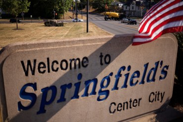 A photo of a sign that reads "Welcome to Springfield's Center City."